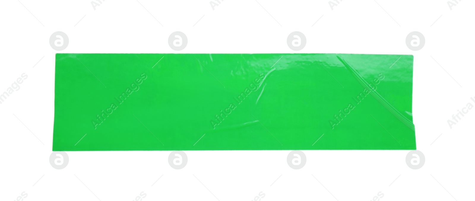 Photo of Piece of green adhesive tape isolated on white, top view