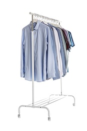 Photo of Wardrobe rack with men clothes on white background