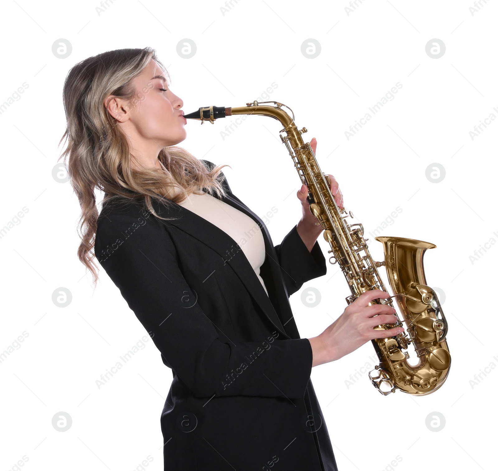 Photo of Beautiful young woman in elegant suit playing saxophone on white background