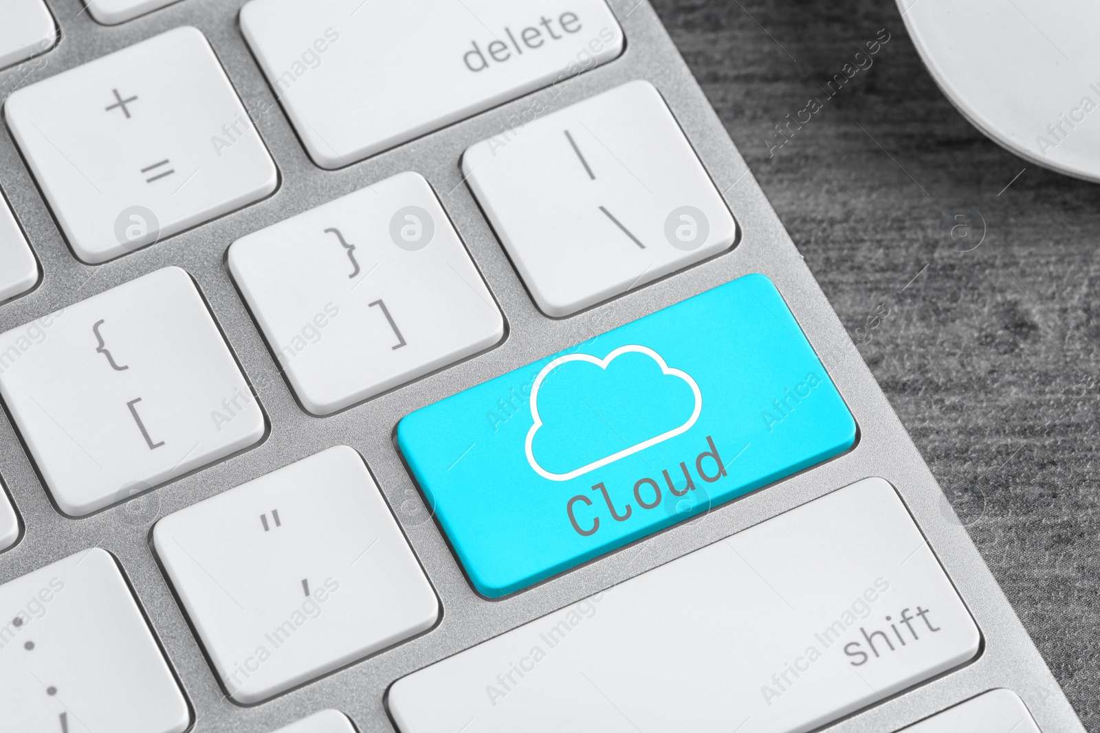 Image of Cloud technology. Modern computer keyboard on table, closeup view 