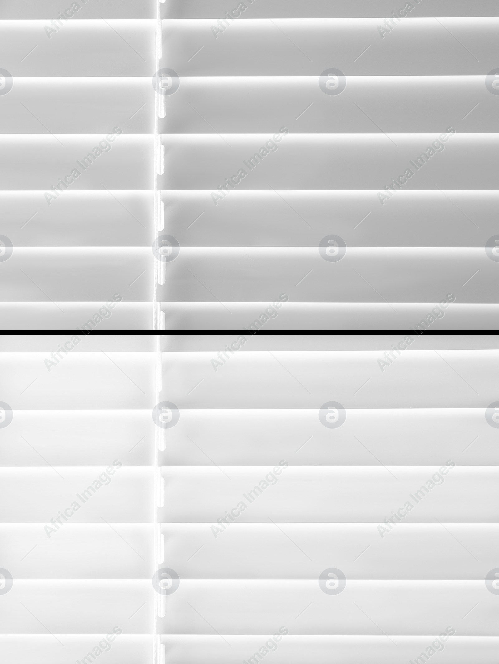 Image of Window blinds before and after cleaning, closeup