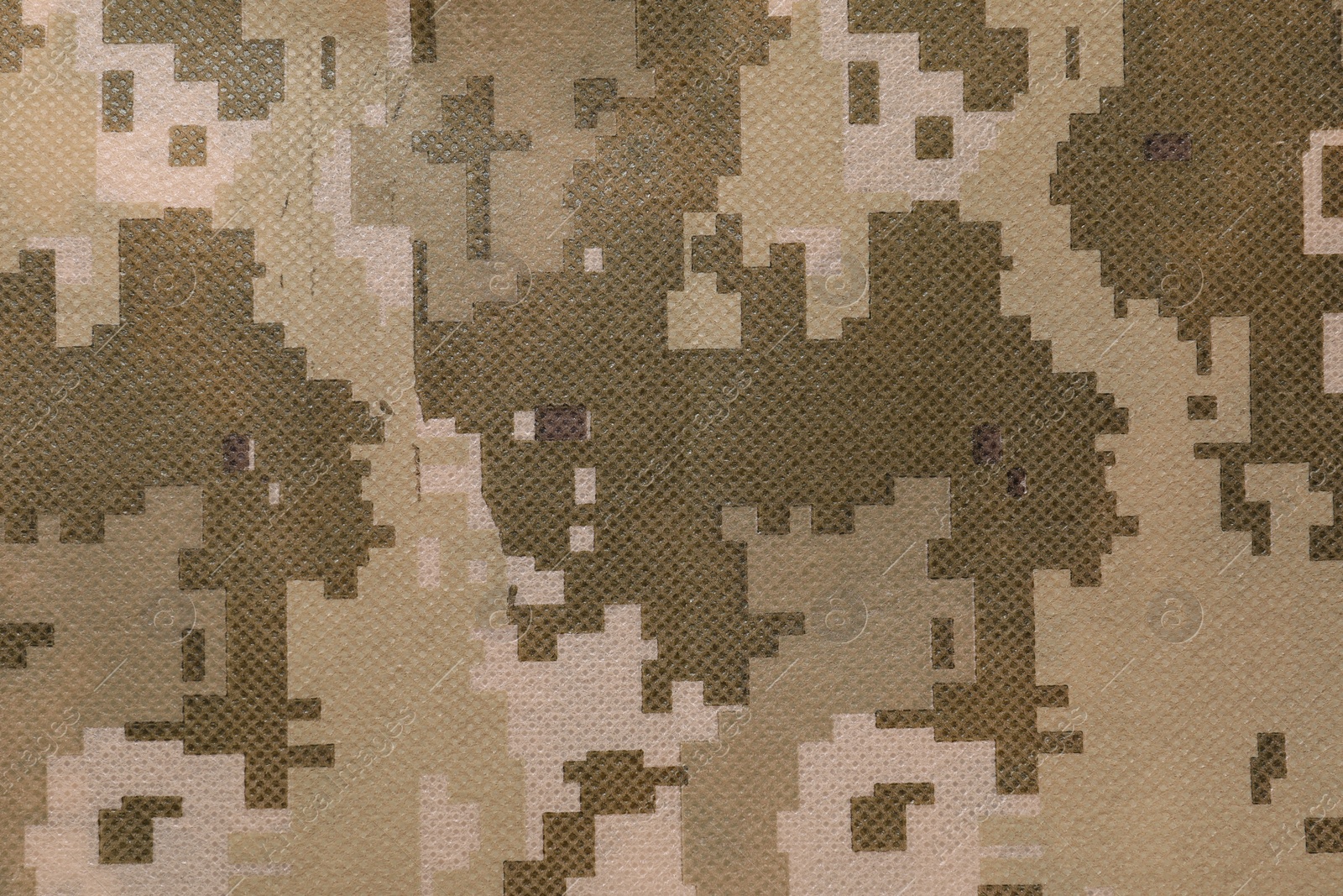 Photo of Texture of camouflage fabric as background, top view