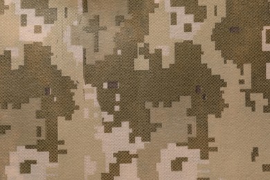 Texture of camouflage fabric as background, top view