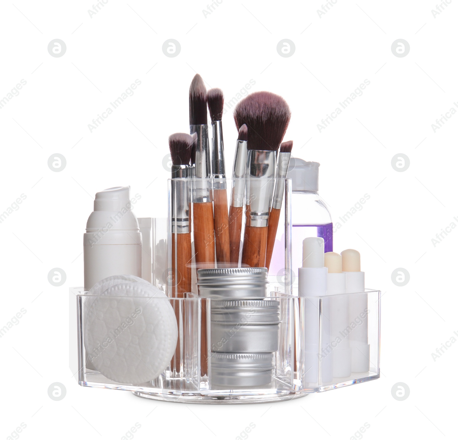 Photo of Cosmetic products in organizer on white background