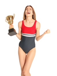 Photo of Happy young woman in swimwear holding golden cup on white background