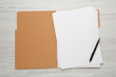 Photo of Yellow file with blank sheets of paper and pen on white wooden table, top view. Space for design