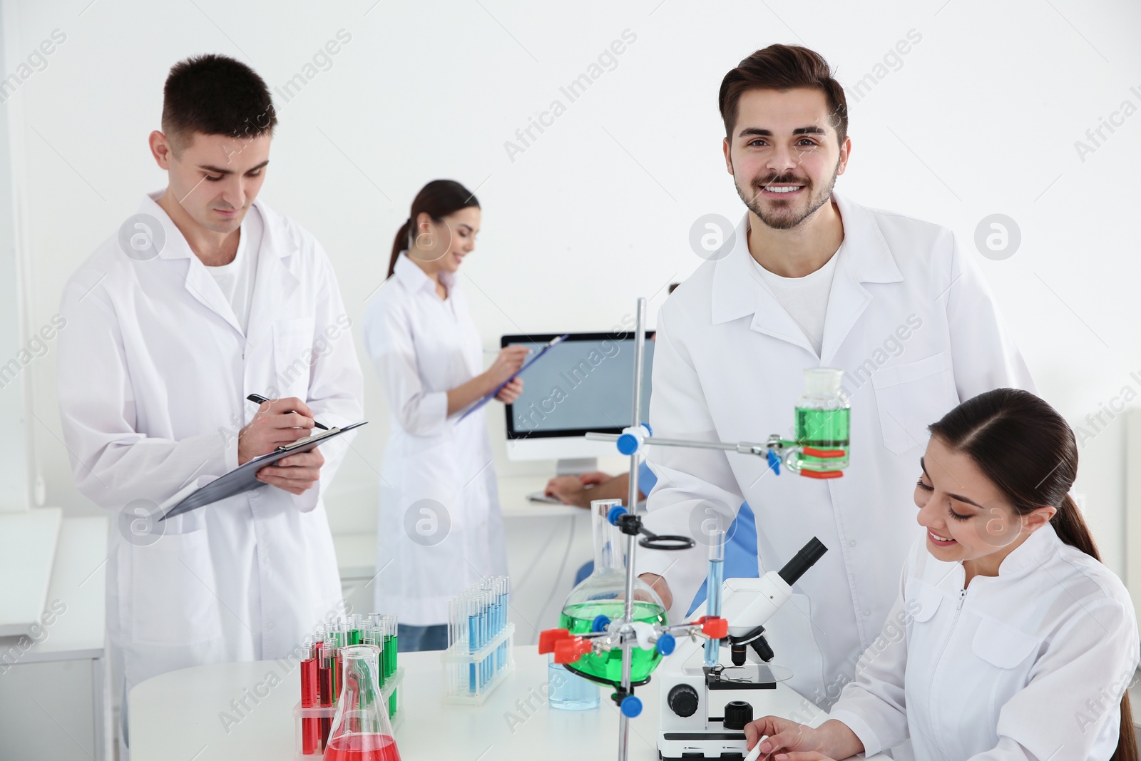 Photo of Medical students working in modern scientific laboratory