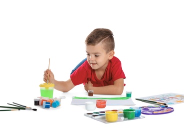 Photo of Cute child painting picture on white background