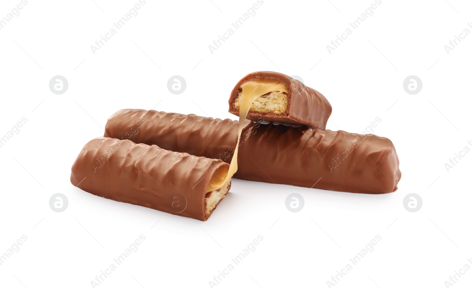 Photo of Sweet tasty chocolate bars with caramel on white background