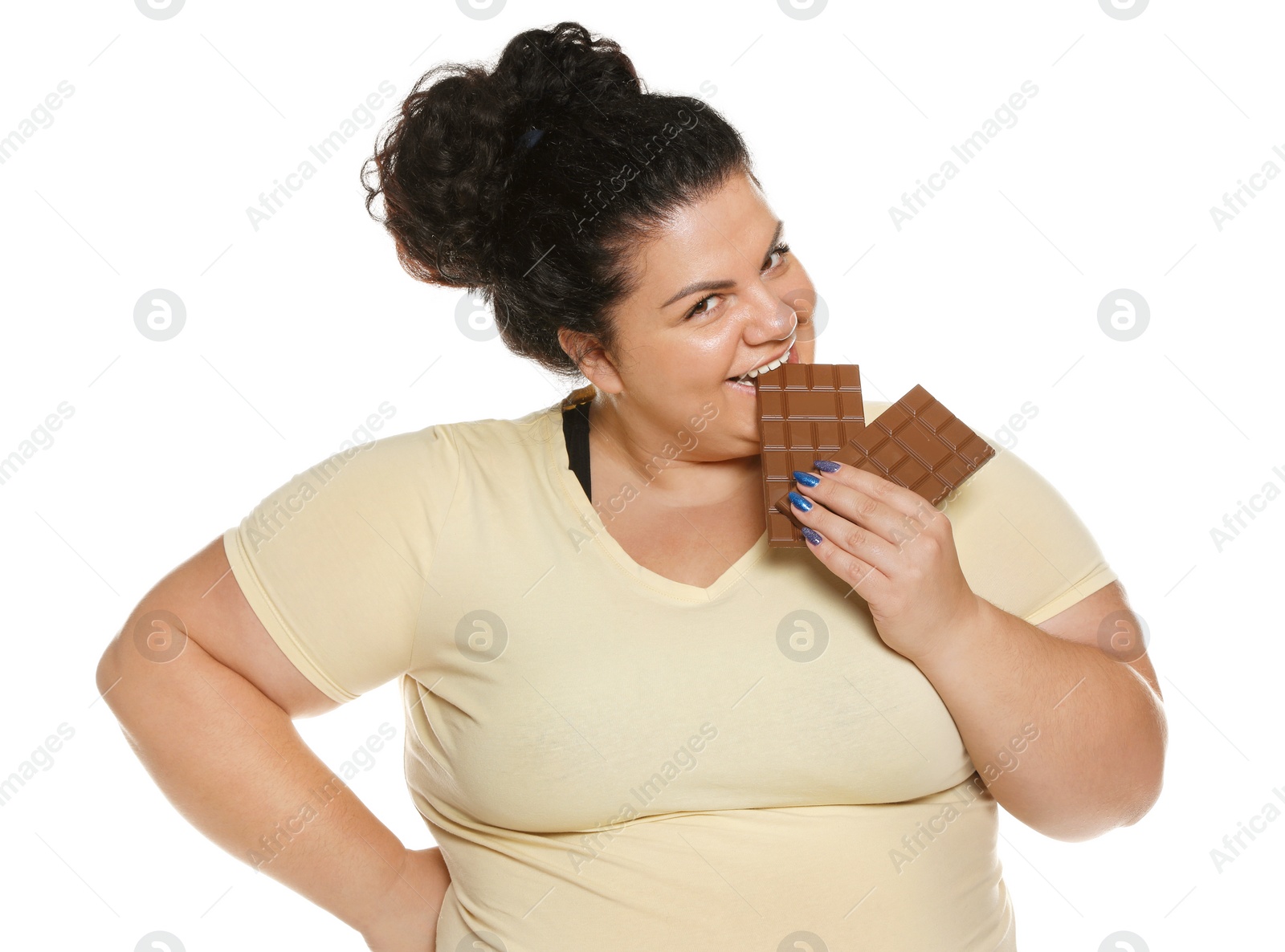 Photo of Happy overweight woman with chocolate on white background