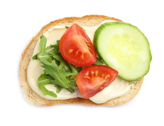 Photo of Slice of bread with spread and vegetables on white background, top view