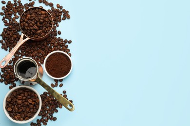 Photo of Flat lay composition with ground coffee and roasted beans on light blue background, space for text