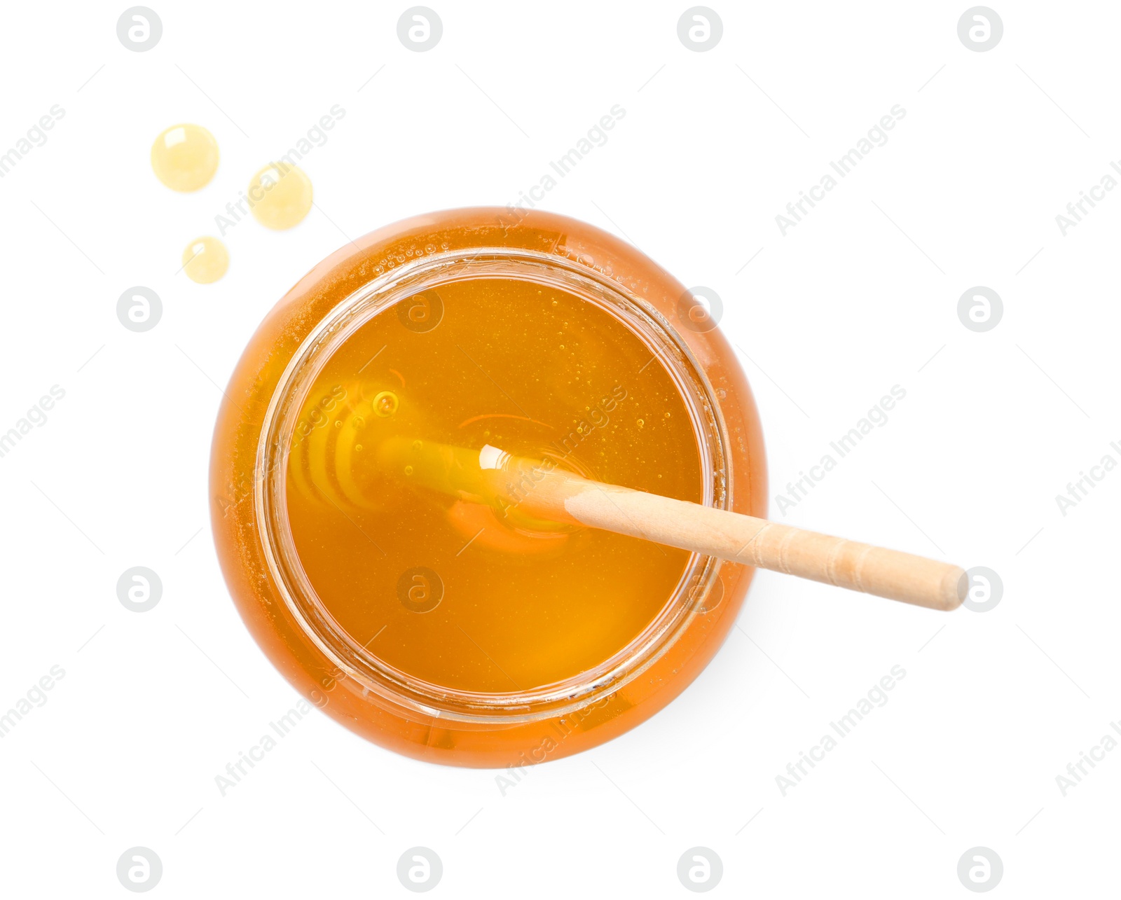 Photo of Tasty honey and dipper in glass jar isolated on white, top view