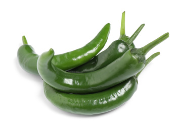 Green hot chili peppers on white background