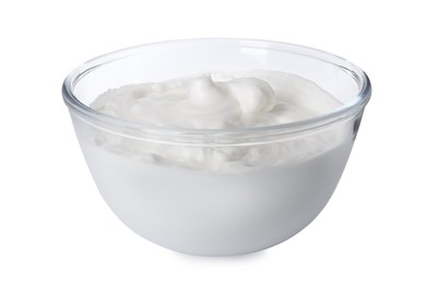 Photo of Glass bowl with whipped cream isolated on white