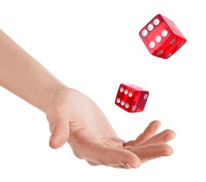 Man throwing red dice on white background, closeup