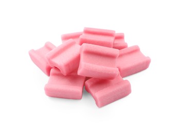 Photo of Pile of tasty pink chewing gums on white background