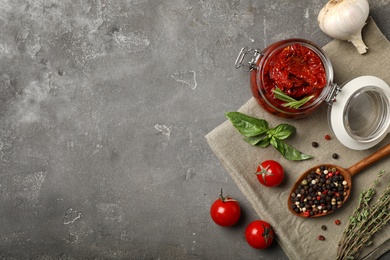 Photo of Flat lay composition with dried tomatoes and space for text on table