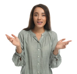 Photo of Young woman in casual clothes talking on white background