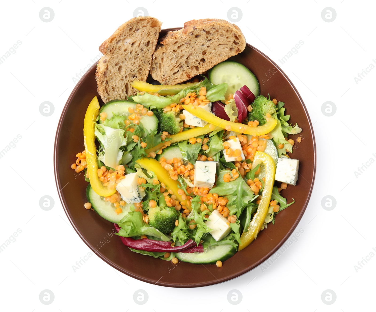 Photo of Plate of delicious salad with lentils, vegetables and bread isolated on white, top view