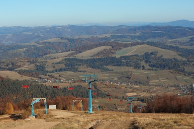 Photo of Mountain landscape with chairlift on sunny day