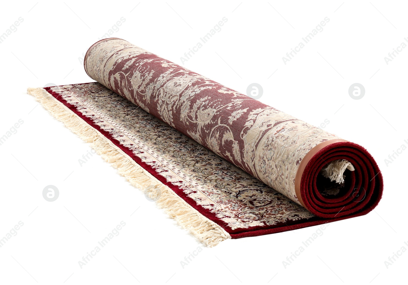 Photo of Rolled carpet with pattern on white background. Interior element