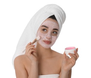 Photo of Woman applying pomegranate face mask on white background