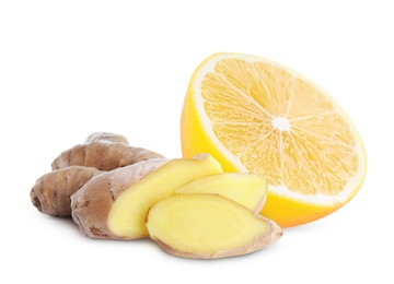 Fresh ginger root and lemon on white background