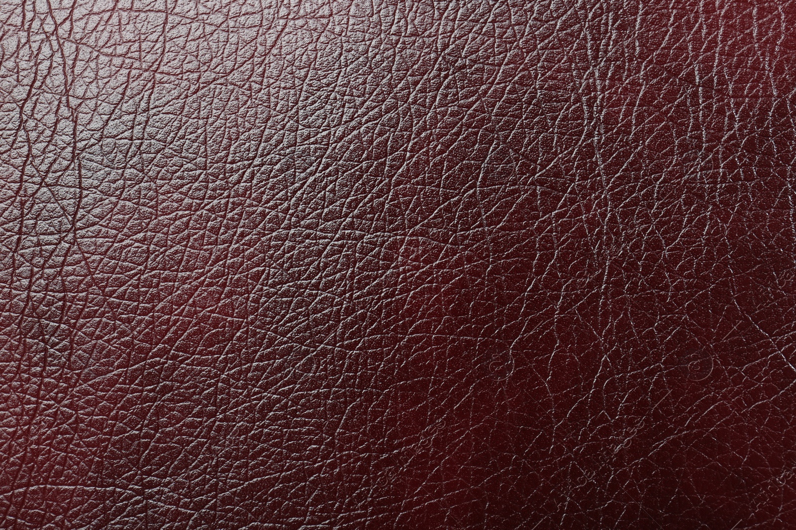 Photo of Texture of natural leather as background, top view