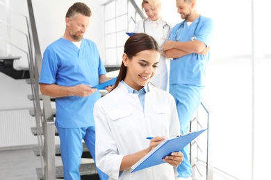 Photo of Doctors and medical assistants in clinic. Health care service