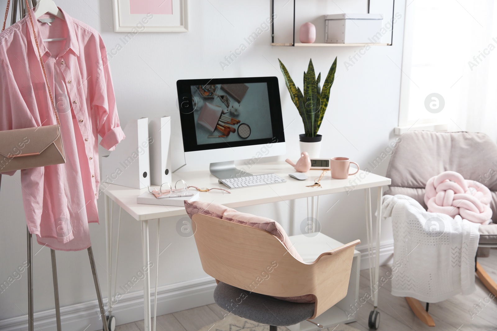 Photo of Comfortable workplace with computer on desk in home office