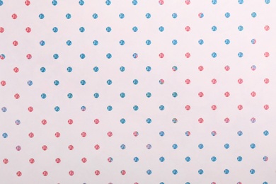 Photo of Colorful paper sheet with stylish pattern as background, top view