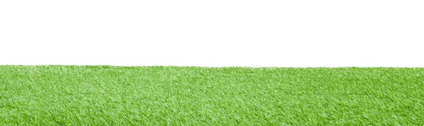 Photo of Green artificial grass surface isolated on white