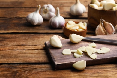 Fresh garlic on wooden table. Organic product