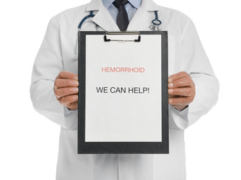 Photo of Doctor holding clipboard with words HEMORRHOID WE CAN HELP on white background, closeup