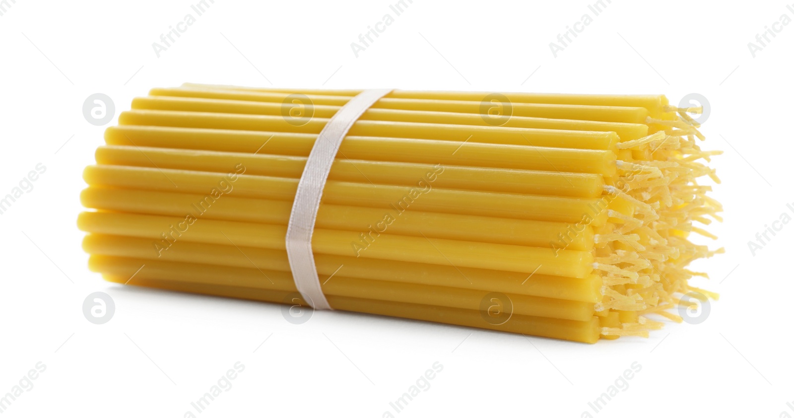 Photo of Many church wax candles isolated on white