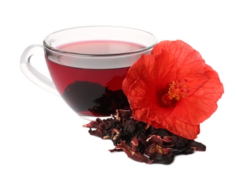 Photo of Delicious hibiscus tea and dry flowers on white background