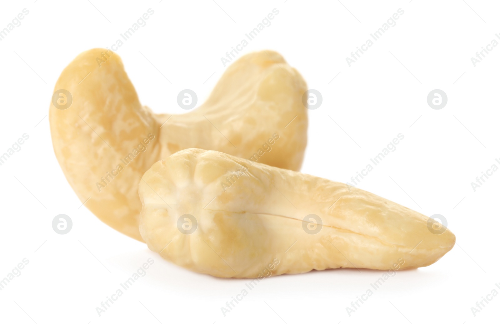 Photo of Tasty organic cashew nuts isolated on white