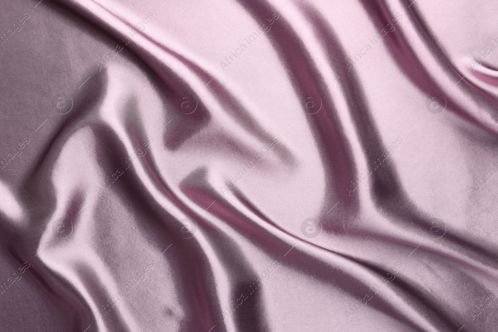 Photo of Texture of beautiful silk fabric as background, closeup