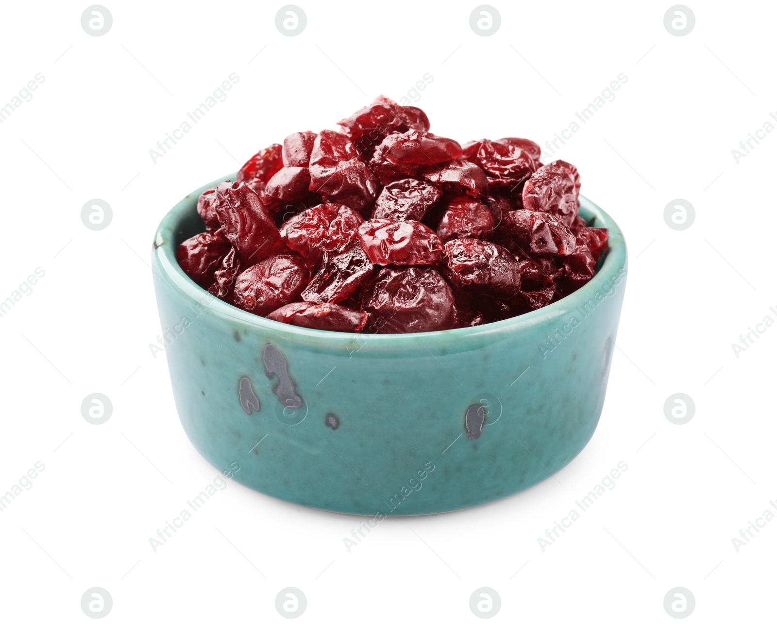 Photo of Dried cranberries in bowl isolated on white