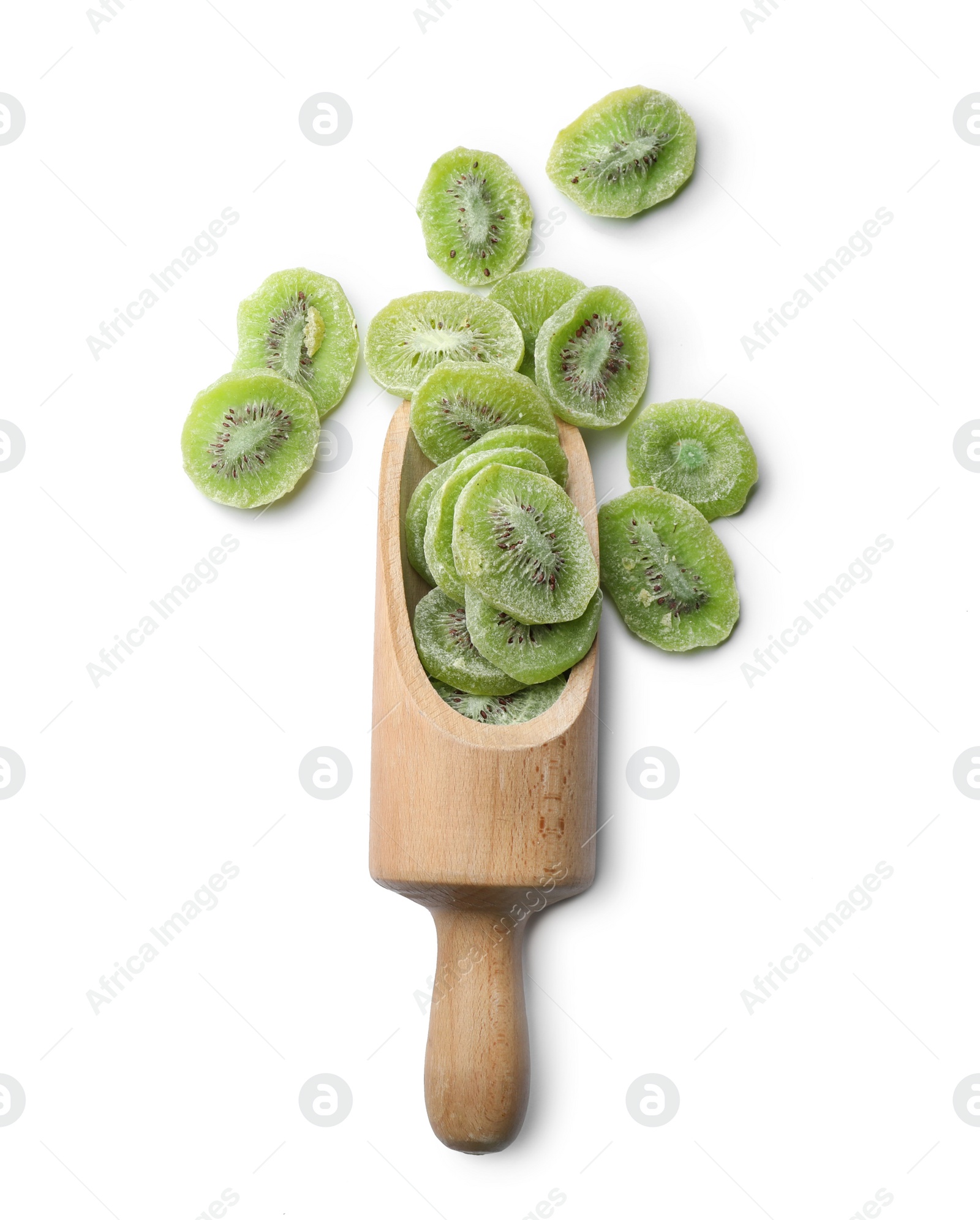 Photo of Scoop with slices of kiwi on white background, top view. Dried fruit as healthy food