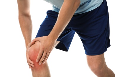 Photo of Man having knee problems on white background, closeup