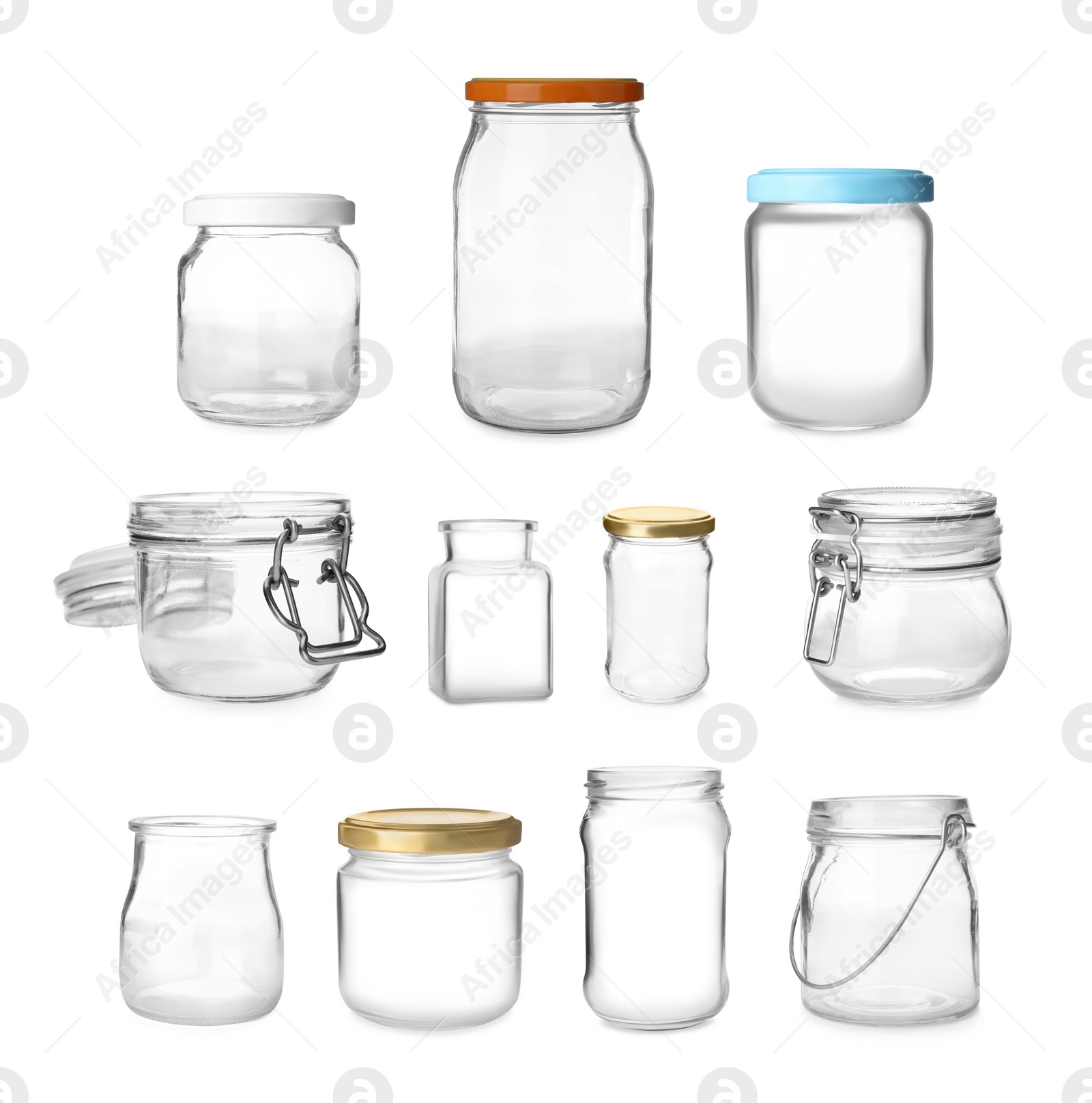 Image of Set with different empty glass jars on white background