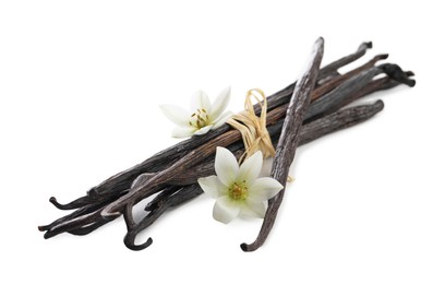 Photo of Vanilla pods, and flowers isolated on white