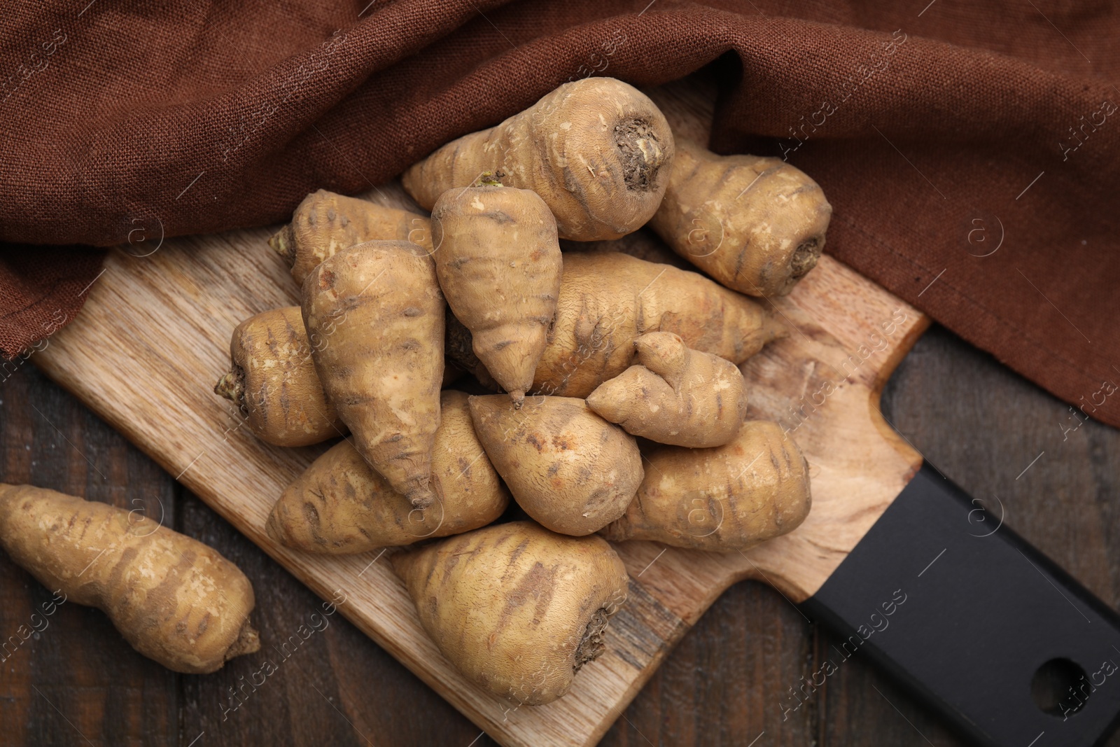 Photo of Tubers of turnip rooted chervil on table, top view