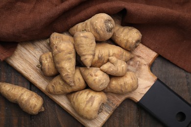 Photo of Tubers of turnip rooted chervil on table, top view