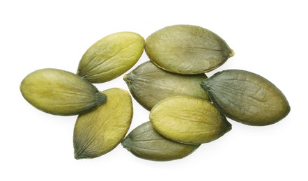 Pumpkin seeds isolated on white, top view