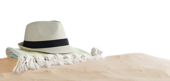 Photo of Folded towel, hat and shell on sand against white background, space for text. Beach objects