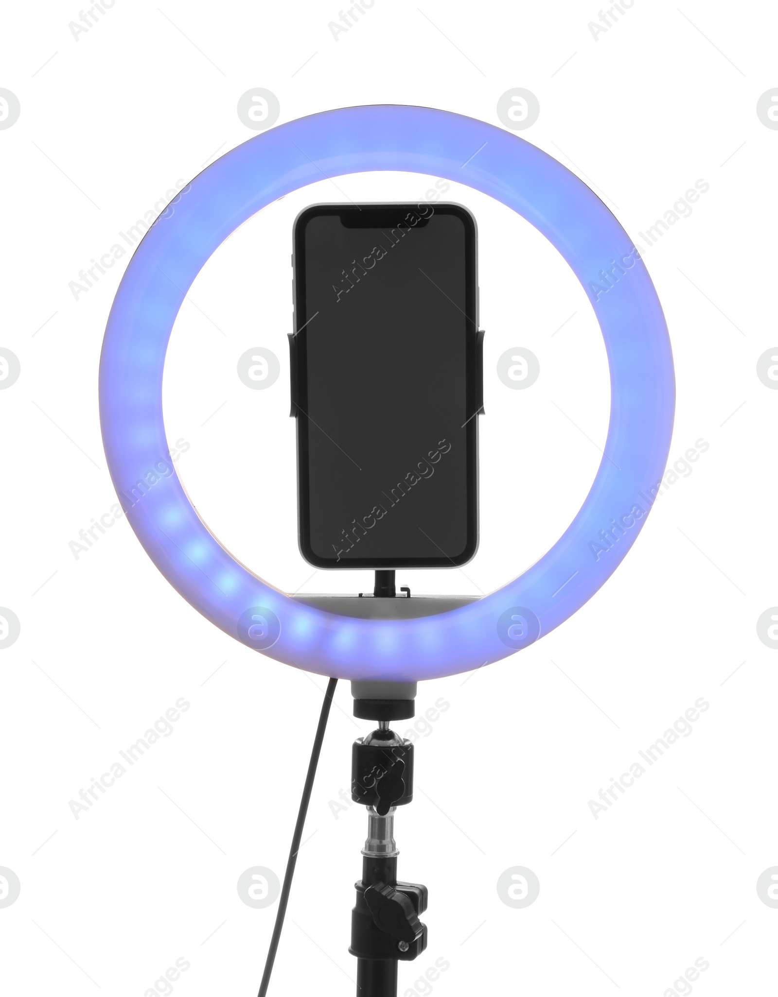 Photo of Tripod with ring light and smartphone isolated on white