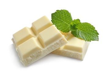 Pieces of white chocolate with mint on white background